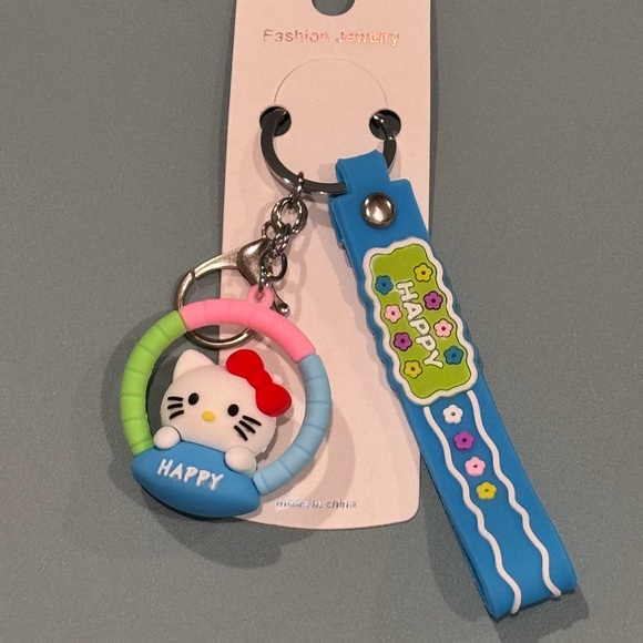 Bag Charm Cartoon Hello Kitty Colorful Wrist Keychain - Red, Blue, Purple & Pink - Picture 1 of 8